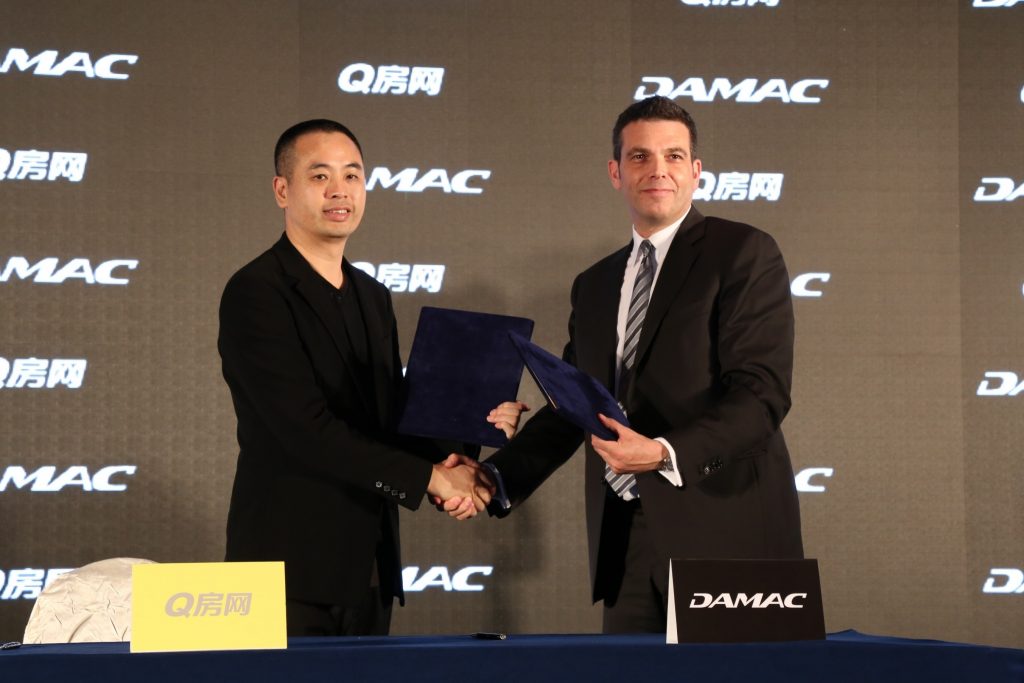 Ziad El Chaar Managing Director of DAMAC Properties and Liang Wenhua Chairman of Qfang China exchange signed agreements