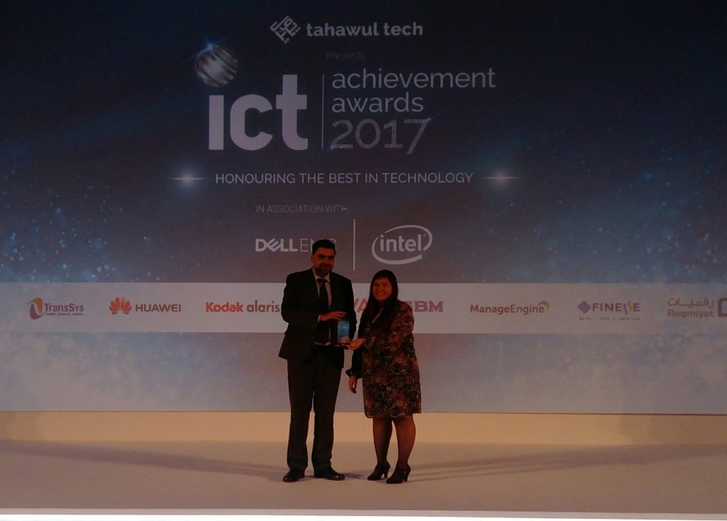 Tristar Head of IT Adama Lalani receives the Best Logistics Innovation and Technology Strategy Award from CPI Media Group Online Editor Adelle Geronimo