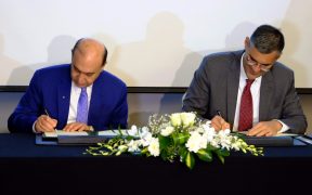 Admiral Mohab Mamish and Agility CEO Tarek Sultan sign a protocol of cooperation