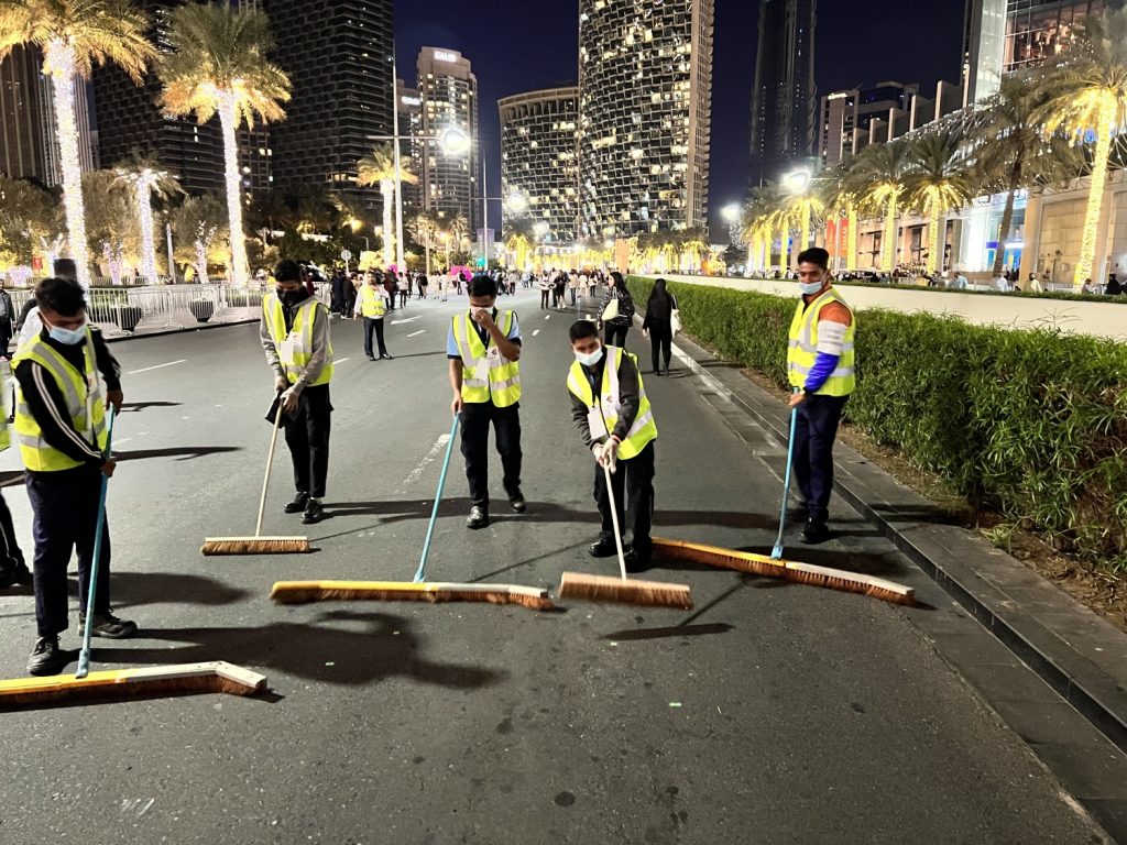 Emrill team in action in at the new year eves clean up in Downtown Dubai